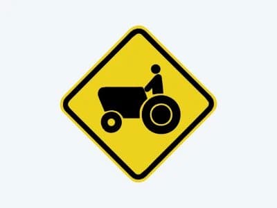 Placa de advertência A-31: Trânsito de tratores ou maquinaria agrícola